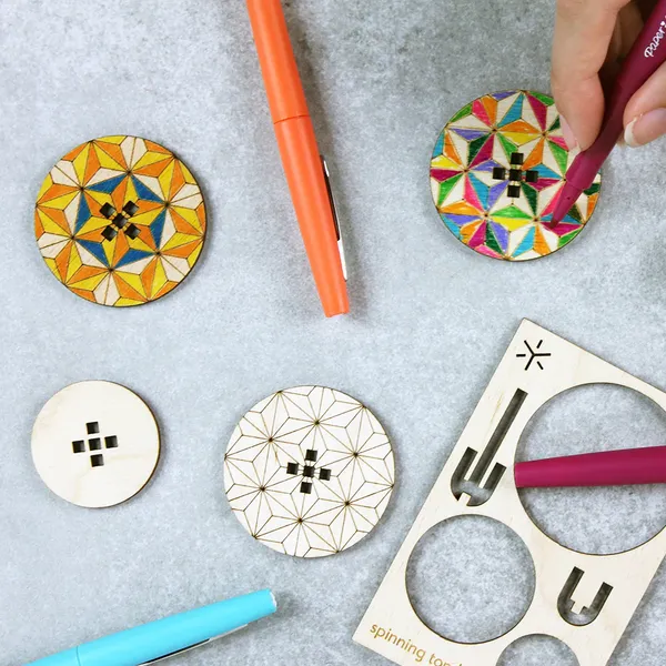 Bright Beam Goods: Geometric Spinning Tops