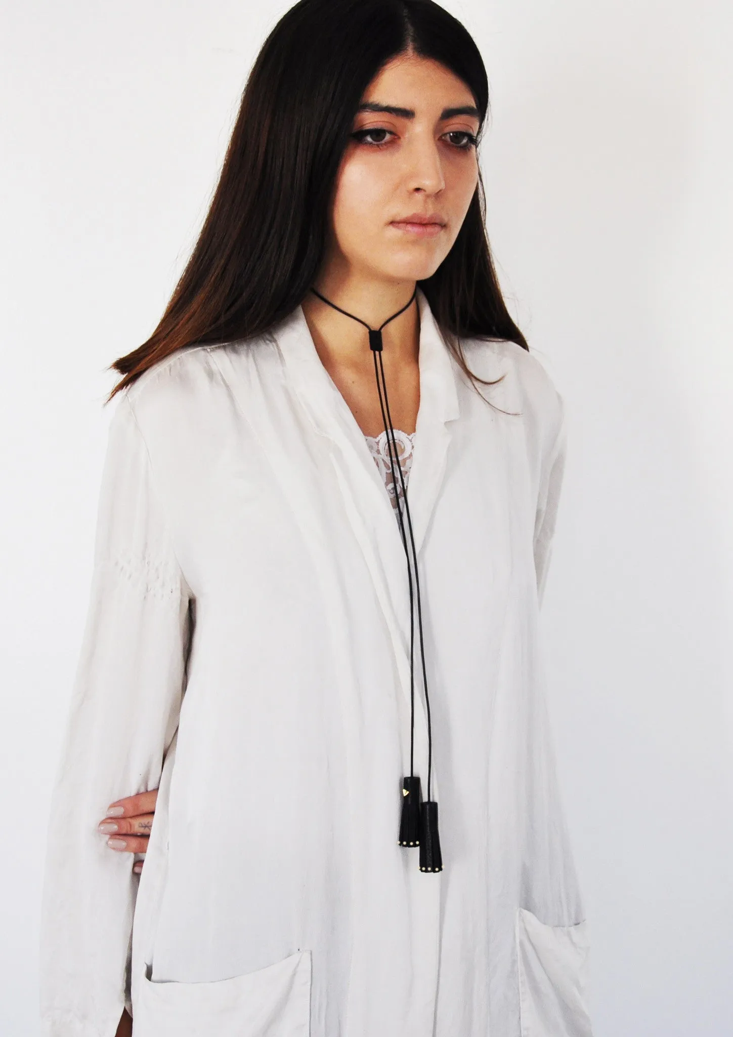 Studded Leather Bolo Tassel Necklace